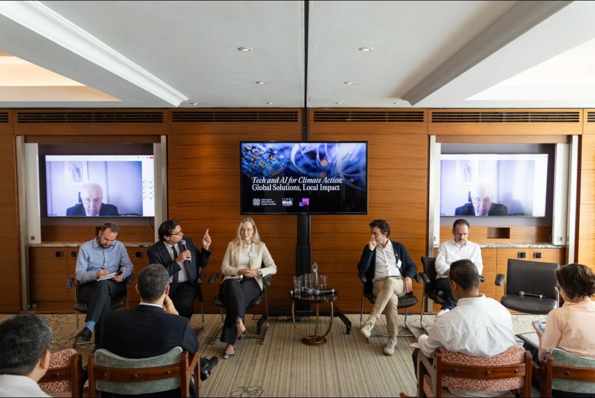 Krista Tukiainen speaking on the "Tech & AI for Climate Action" panel